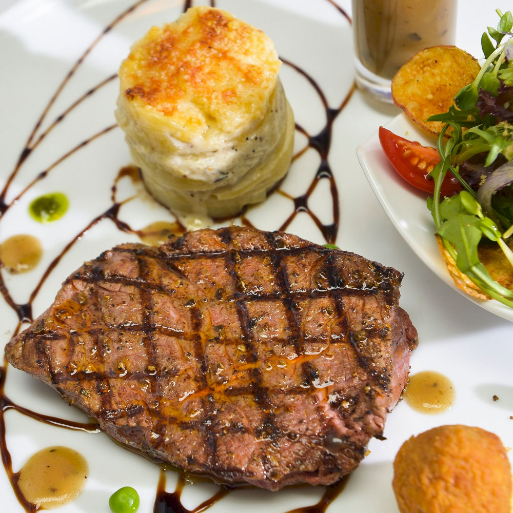 These dishes exemplify the restaurant's dedication to blending French culinary techniques with local Vietnamese ingredients